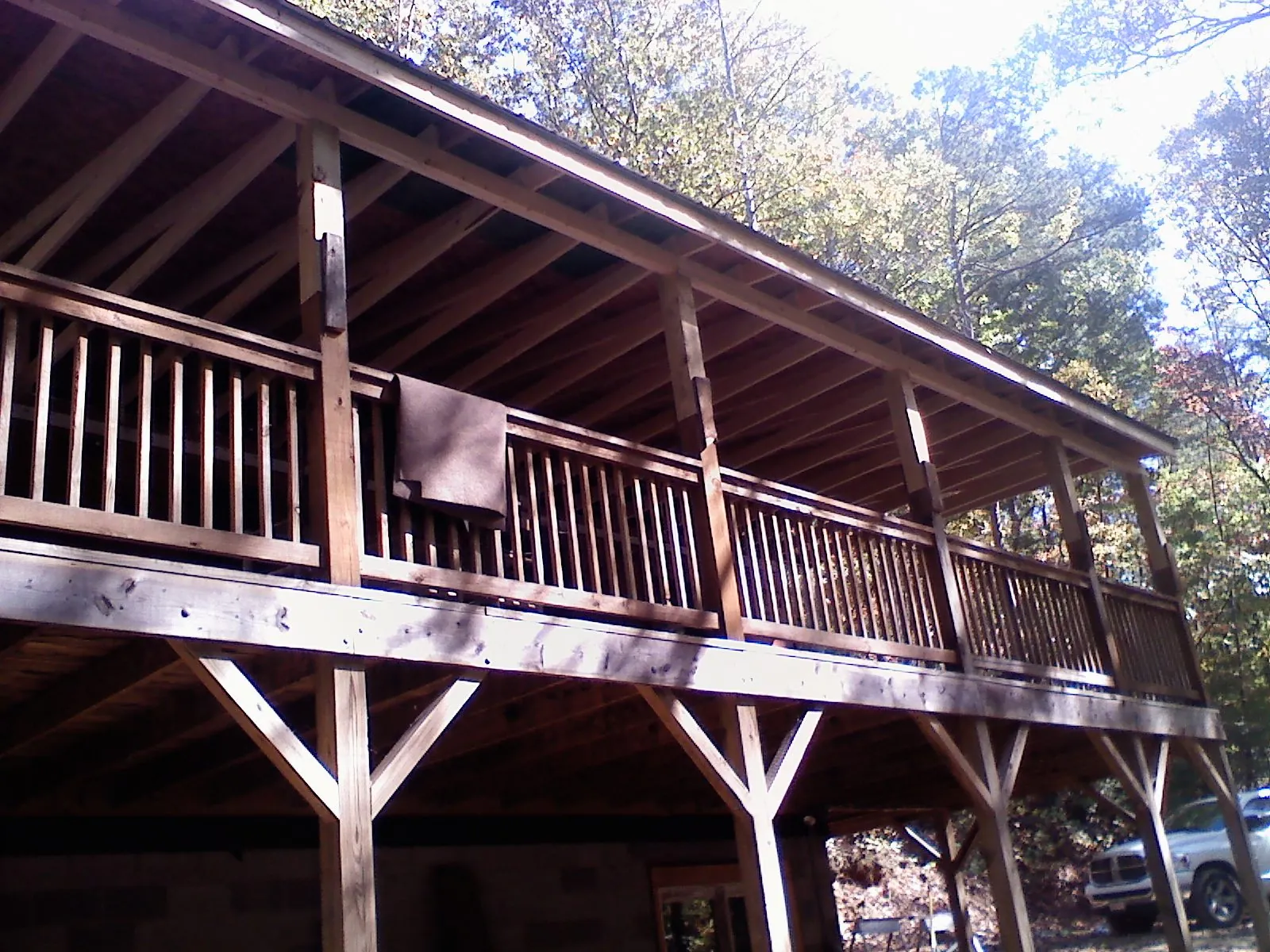 Timber framing under a new elevated porch and deck — Roof Leak Repair in Brownell by Roofing Brothers